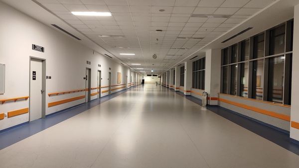 Long, empty hospital corridor
